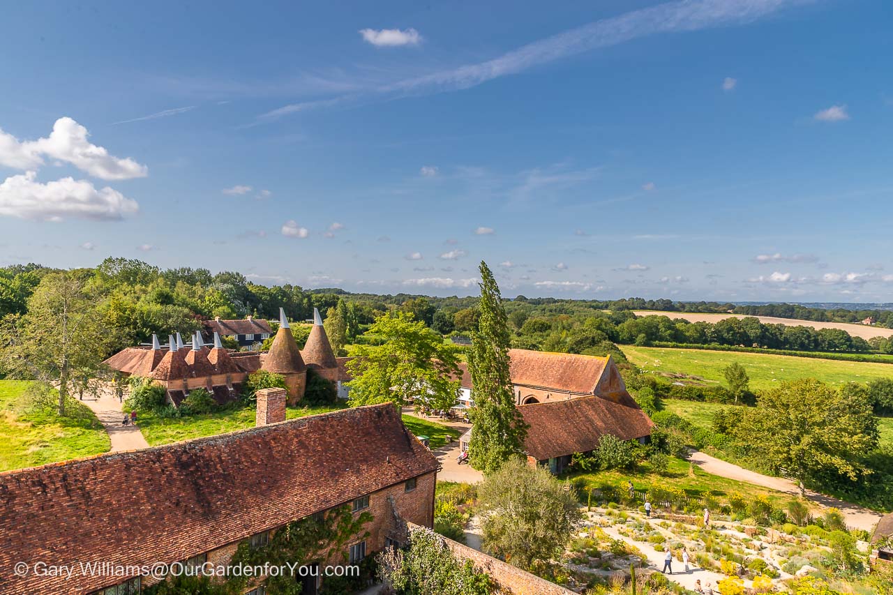A view from Sissinghurst Castle tower to the oast houses & Elizabethan barn in the estate grounds