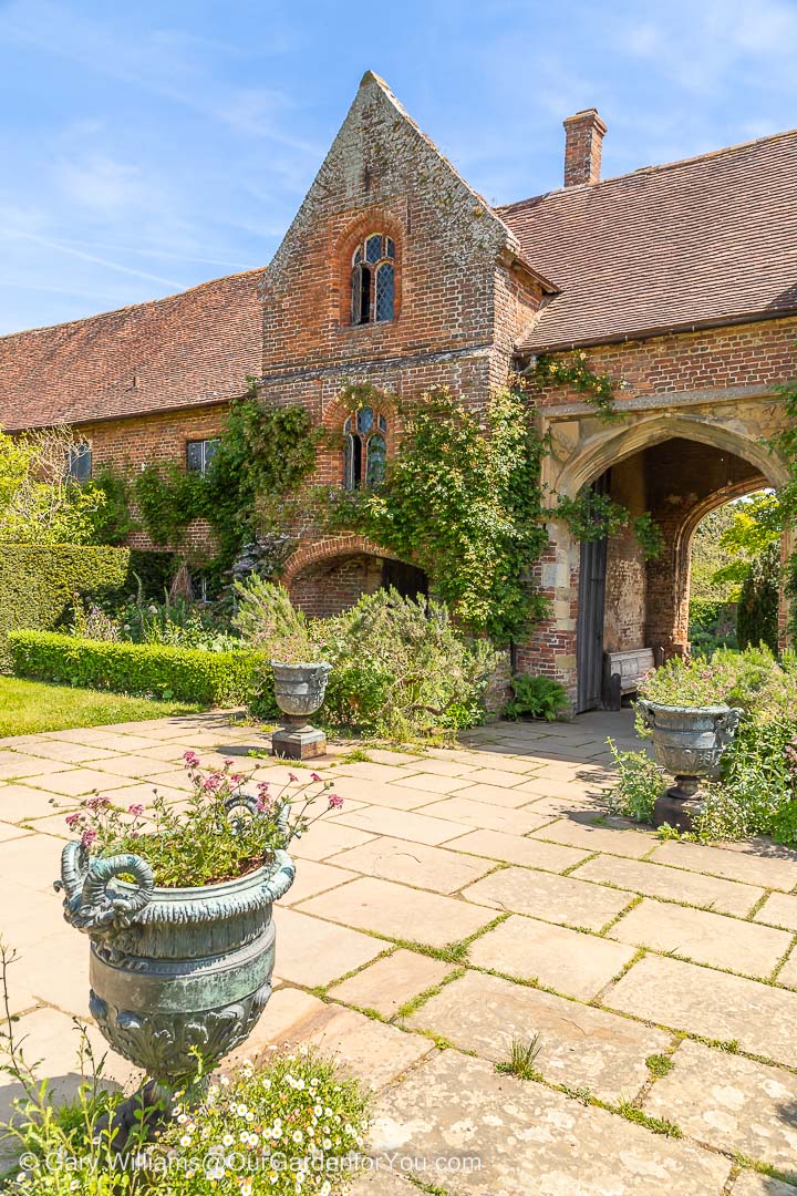 The stone courtyard before the entrance into one of the National Trust's most beautiful gardens in Kent, Sissinghurst Castle Garden