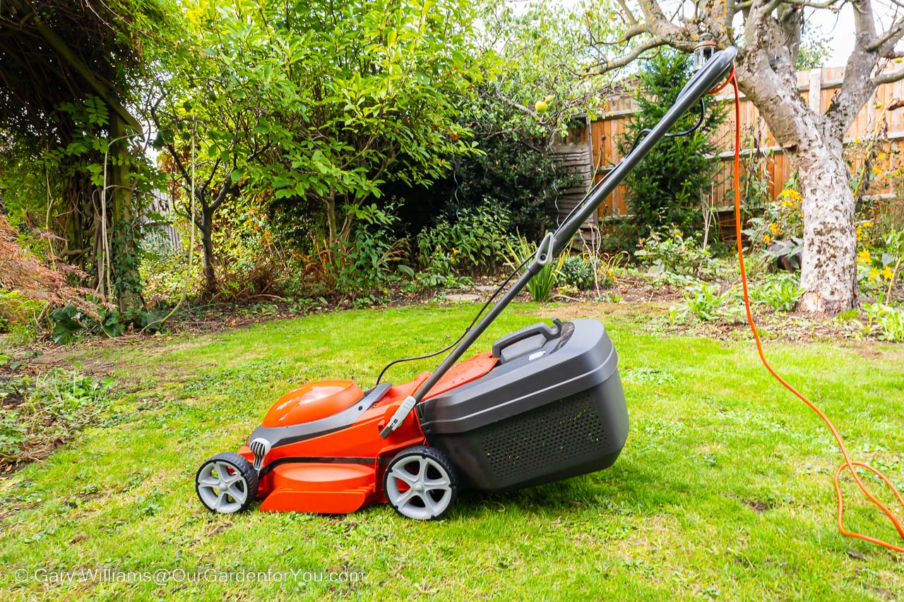 The Flymo EasiStore 340R lawn mower is prepared Ready for use on the Lawn