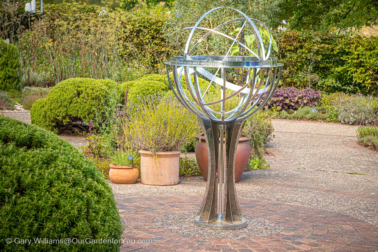 An orbital feature stainless steel is the centrepiece of the Herb Garden.